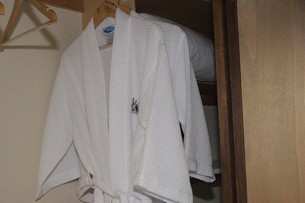 Dorrington Vacation Rental Cabins - A robe hanging in a closet.