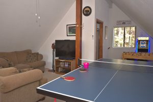 Ping pong and TV in the game room